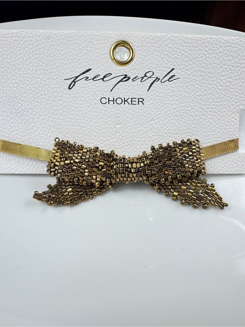 Free People Metallic Gold Beaded Bow Choker